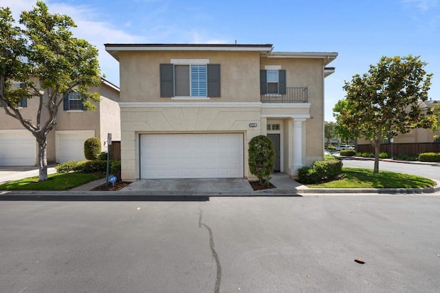 210 Belflora Way, Oceanside, CA 92057 - view of front of property with a garage, stucco siding, and concrete driveway
