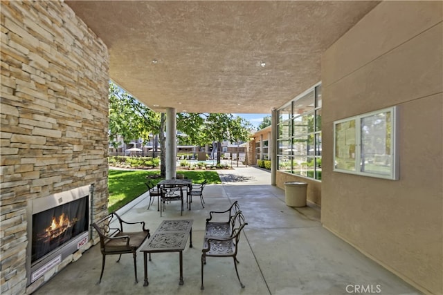 31387 Taylor Ln, Temecula, CA 92592 - view of patio / terrace with an outdoor stone fireplace