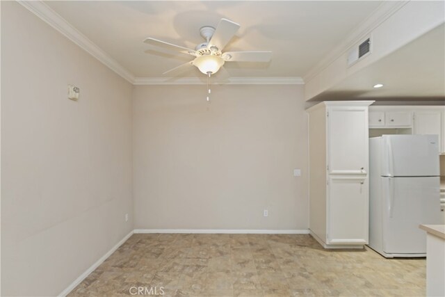 31387 Taylor Ln, Temecula, CA 92592 - kitchen featuring freestanding refrigerator, a ceiling fan, ornamental molding, white cabinetry, and light countertops