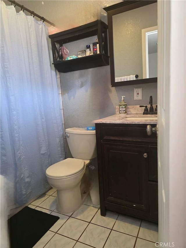 12157 Nava St, Norwalk, CA 90650 - bathroom featuring vanity, tile patterned flooring, a shower with shower curtain, and a textured wall