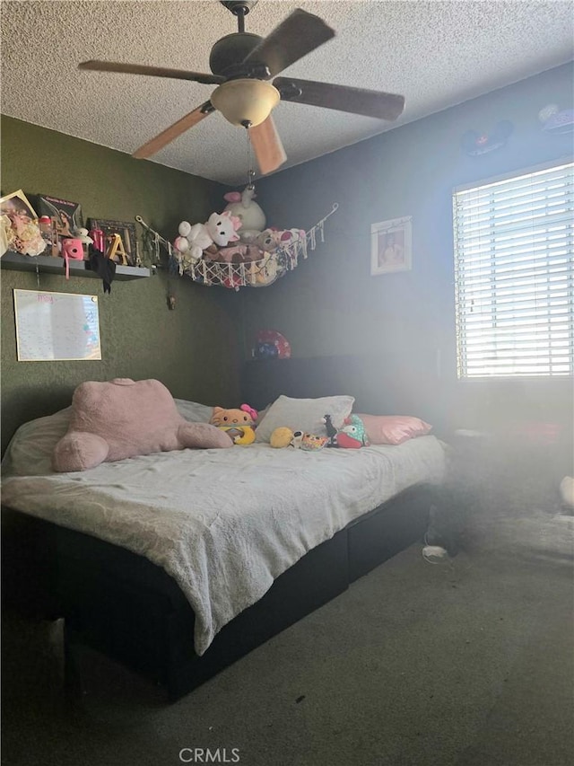12157 Nava St, Norwalk, CA 90650 - carpeted bedroom with a textured ceiling and a ceiling fan