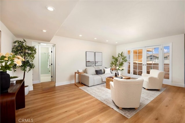 1010 Palm Ave Unit 207, West Hollywood, CA 90069 - living room with french doors, light wood-style flooring, and recessed lighting