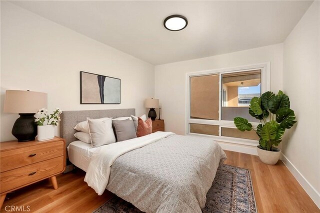 1010 Palm Ave Unit 207, West Hollywood, CA 90069 - bedroom with wood finished floors and baseboards