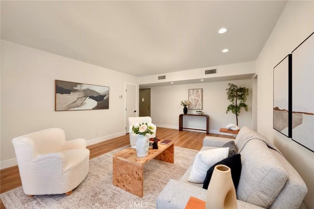 1010 Palm Ave Unit 207, West Hollywood, CA 90069 - living area featuring wood finished floors and recessed lighting