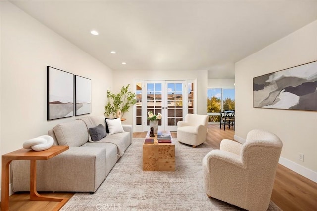 1010 Palm Ave Unit 207, West Hollywood, CA 90069 - living room featuring wood finished floors, recessed lighting, and french doors