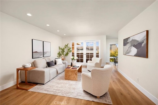 1010 Palm Ave Unit 207, West Hollywood, CA 90069 - living area featuring light wood finished floors, french doors, and recessed lighting