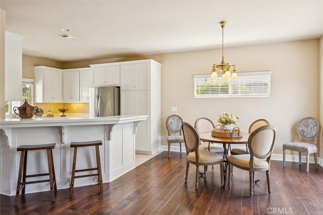 1432 Blackberry Ave, Arroyo Grande, CA 93420 - dining space featuring a chandelier and dark wood-style floors