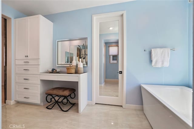 133 Denali, Lake Forest, CA 92630 - full bathroom featuring a soaking tub and baseboards