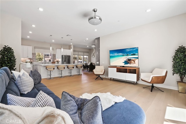 133 Denali, Lake Forest, CA 92630 - living room with light wood-style flooring and recessed lighting