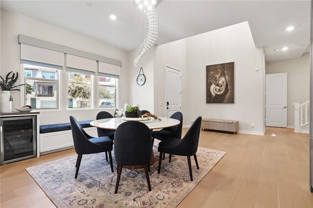 133 Denali, Lake Forest, CA 92630 - dining space featuring wine cooler, light wood finished floors, and recessed lighting