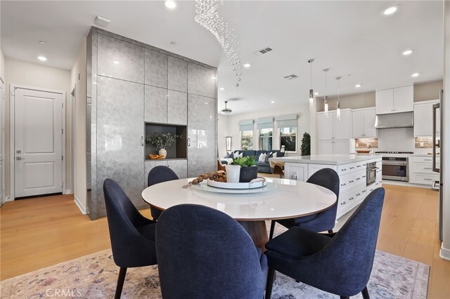 133 Denali, Lake Forest, CA 92630 - dining area featuring light wood finished floors and recessed lighting