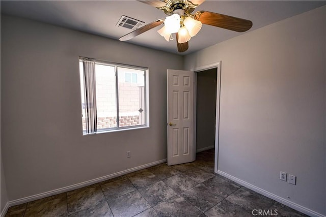 9464 Palm Dr, Desert Hot Springs, CA 92240 - empty room featuring baseboards and a ceiling fan