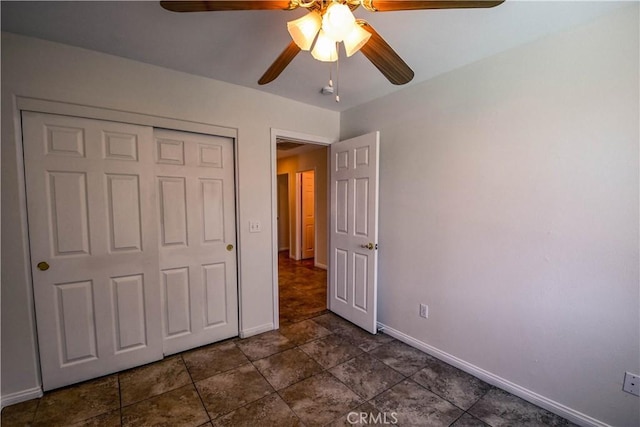 9464 Palm Dr, Desert Hot Springs, CA 92240 - unfurnished bedroom with a closet and ceiling fan
