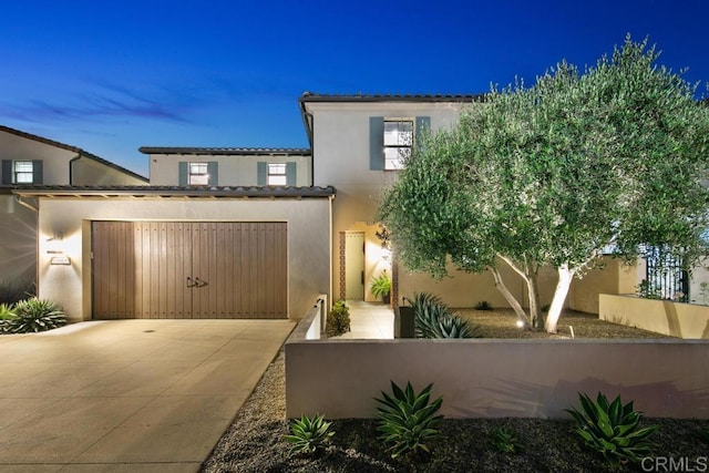15614 S Chevy Chase, San Diego, CA 92127 - view of front of house with driveway, stucco siding, and an attached garage