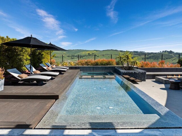 15614 S Chevy Chase, San Diego, CA 92127 - view of pool featuring a fire pit, a pool with connected hot tub, and a patio