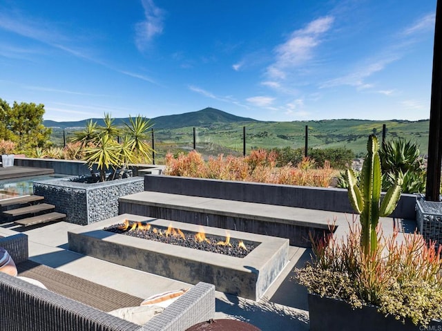 15614 S Chevy Chase, San Diego, CA 92127 - view of patio with a fire pit and a mountain view