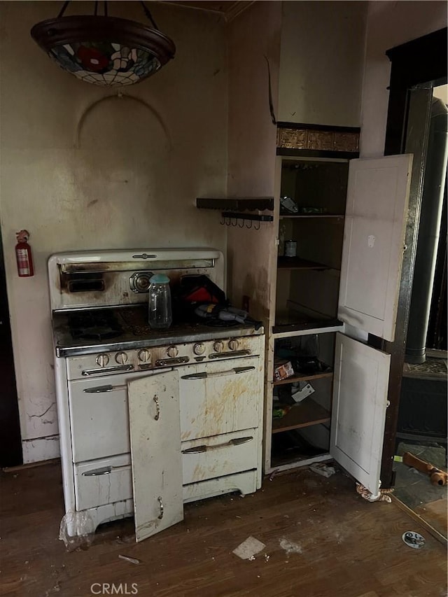 150 N Cambridge St, Orange, CA 92866 - kitchen featuring gas stove, dark wood-style floors, and white cabinets