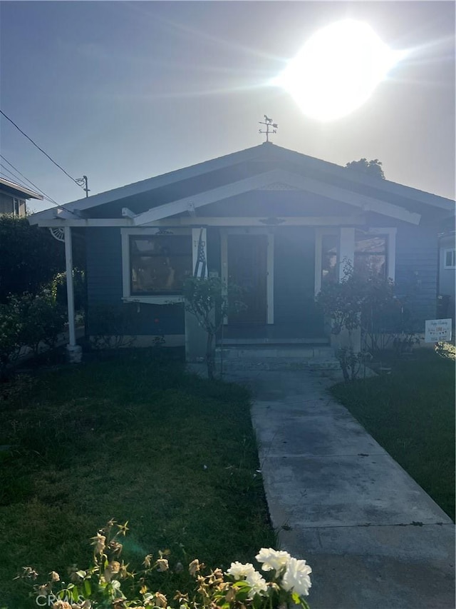 150 N Cambridge St, Orange, CA 92866 - view of front of property with covered porch and a front yard