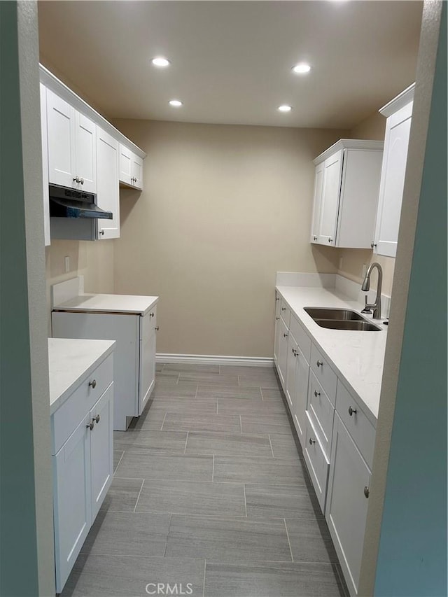 841 W 17th St, San Bernardino, CA 92405 - laundry area with recessed lighting and wood tiled floors