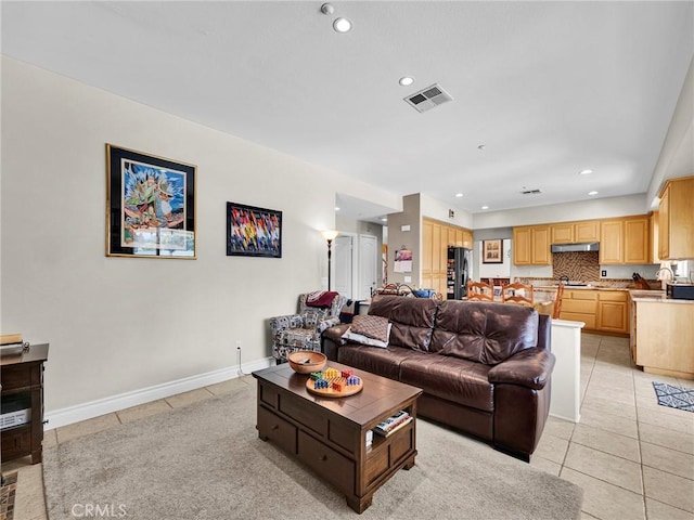 13906 Lexicon Ave, Sylmar, CA 91342 - living room with light tile patterned flooring and recessed lighting