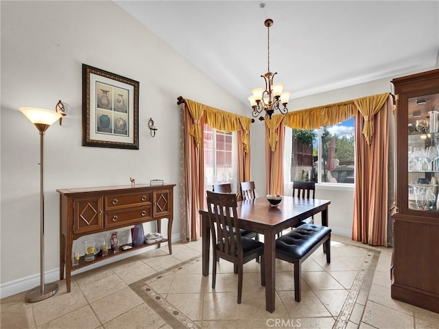 13906 Lexicon Ave, Sylmar, CA 91342 - dining area with inlaid floor details, a chandelier, and vaulted ceiling