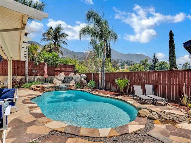 13906 Lexicon Ave, Sylmar, CA 91342 - view of pool with a mountain view, a fenced backyard, a patio, and a jacuzzi
