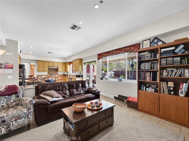 13906 Lexicon Ave, Sylmar, CA 91342 - living room with recessed lighting and light tile patterned flooring
