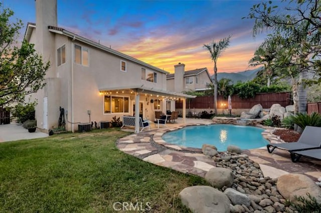 13906 Lexicon Ave, Sylmar, CA 91342 - view of pool with a patio area and a fenced backyard