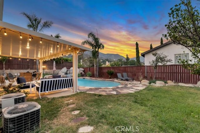 13906 Lexicon Ave, Sylmar, CA 91342 - view of swimming pool with a fenced backyard, a mountain view, and a patio