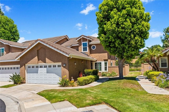 710 S Tourmaline Ct, Anaheim Hills, CA 92807 - traditional-style home featuring a front lawn, concrete driveway, a garage, stucco siding, and a tiled roof