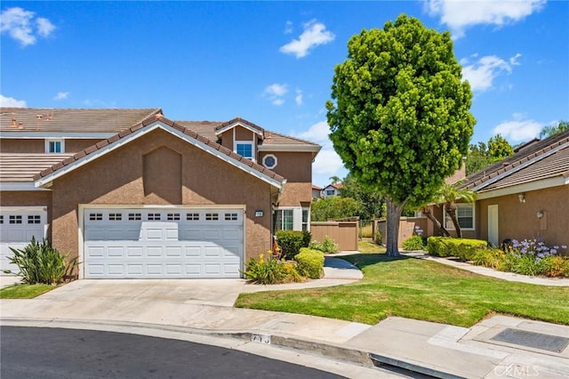 710 S Tourmaline Ct, Anaheim Hills, CA 92807 - traditional home featuring an attached garage, a tiled roof, concrete driveway, and stucco siding