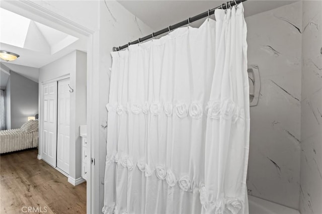 710 S Tourmaline Ct, Anaheim Hills, CA 92807 - ensuite bathroom featuring wood finished floors and a shower with curtain