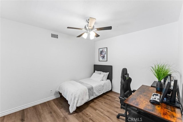 710 S Tourmaline Ct, Anaheim Hills, CA 92807 - bedroom featuring an office area, wood finished floors, and ceiling fan