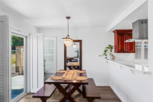 710 S Tourmaline Ct, Anaheim Hills, CA 92807 - dining room featuring wood finished floors and a chandelier