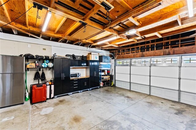 710 S Tourmaline Ct, Anaheim Hills, CA 92807 - garage featuring freestanding refrigerator
