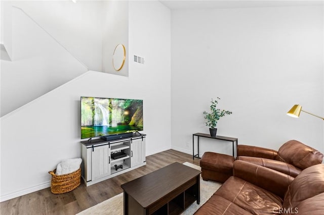 710 S Tourmaline Ct, Anaheim Hills, CA 92807 - living room featuring wood finished floors and vaulted ceiling