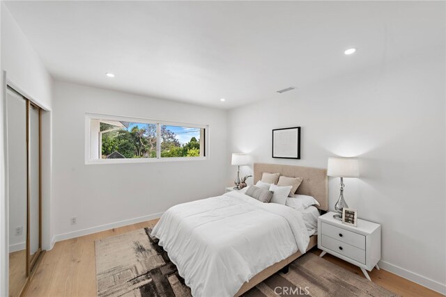 8 Clipper Rd, Rancho Palos Verdes, CA 90275 - bedroom with light wood-style floors and recessed lighting