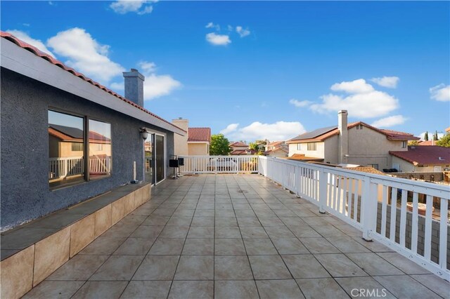 37908 52nd St E, Palmdale, CA 93552 - view of patio / terrace featuring a residential view