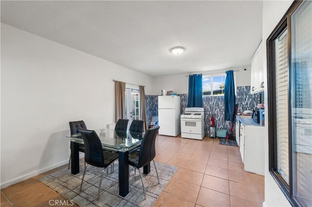 37908 52nd St E, Palmdale, CA 93552 - dining area featuring light tile patterned flooring