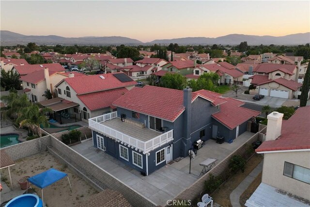 37908 52nd St E, Palmdale, CA 93552 - aerial view at dusk of a mountain view and a residential view