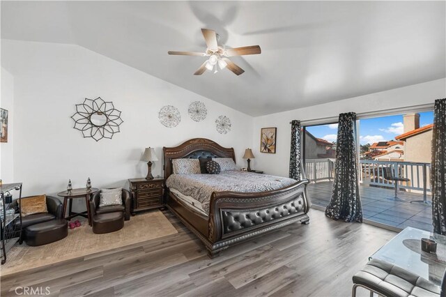 37908 52nd St E, Palmdale, CA 93552 - bedroom with vaulted ceiling, access to exterior, wood finished floors, and ceiling fan