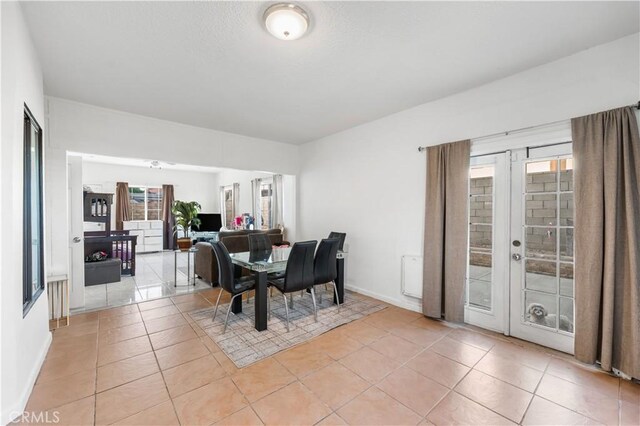 37908 52nd St E, Palmdale, CA 93552 - dining room featuring light tile patterned floors