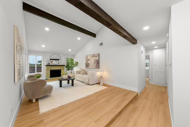 10437 Hermanos Rd, San Diego, CA 92124 - living room featuring light wood-style flooring, a fireplace, and recessed lighting