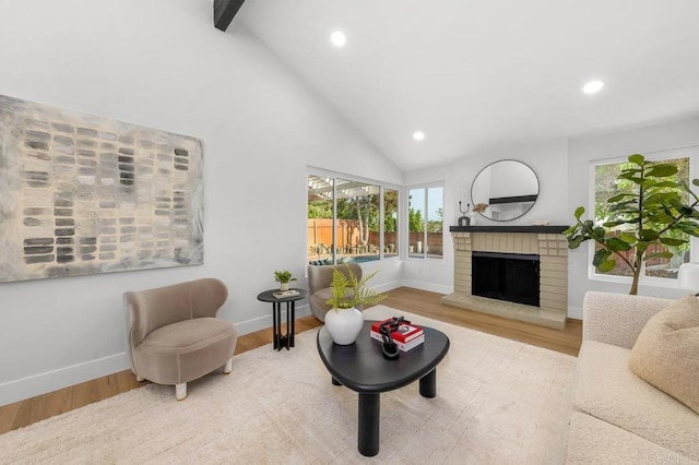 10437 Hermanos Rd, San Diego, CA 92124 - living room with recessed lighting, a fireplace, wood finished floors, and high vaulted ceiling