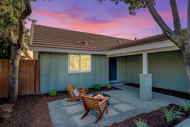 10437 Hermanos Rd, San Diego, CA 92124 - entrance to property featuring board and batten siding and a patio