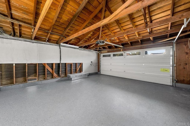 10437 Hermanos Rd, San Diego, CA 92124 - garage featuring a garage door opener