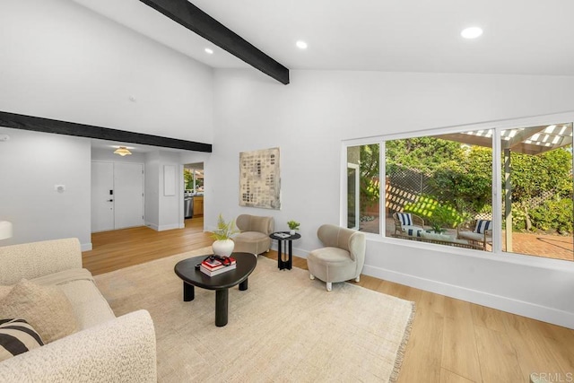 10437 Hermanos Rd, San Diego, CA 92124 - living room with plenty of natural light, high vaulted ceiling, light wood-style floors, beam ceiling, and recessed lighting