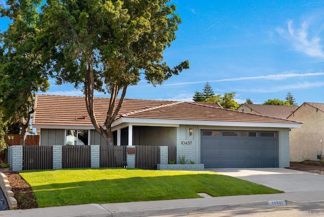 10437 Hermanos Rd, San Diego, CA 92124 - single story home with a garage, concrete driveway, and a tile roof