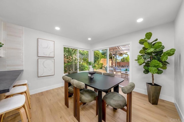 10437 Hermanos Rd, San Diego, CA 92124 - dining space featuring light wood-type flooring and recessed lighting