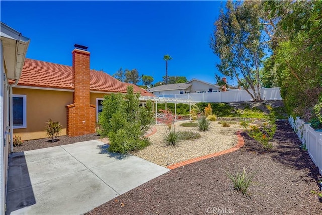 24482 Chrisanta Dr, Mission Viejo, CA 92691 - fenced backyard with a patio area